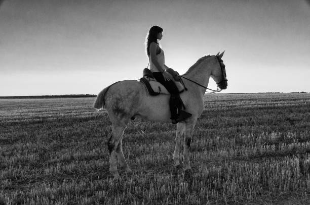istock woman on horseback 959585664
