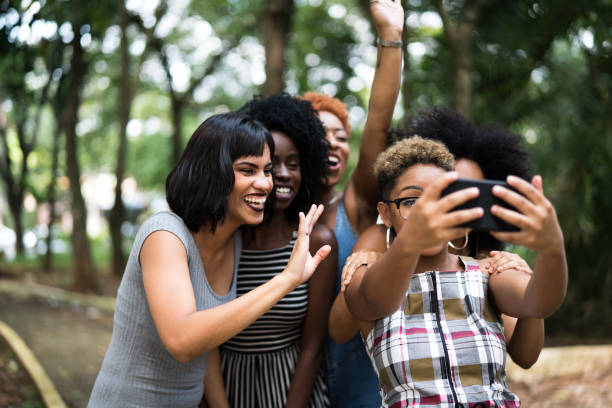 istock Group of a friends taking selfie/making a video chat 959588254
