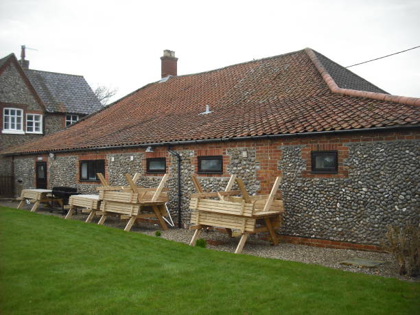 istock Flint-walled village hall, Baconsthorpe, Norfolk 959589776