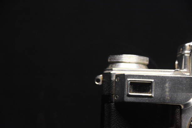 istock An old giant camera On a black background 959590994