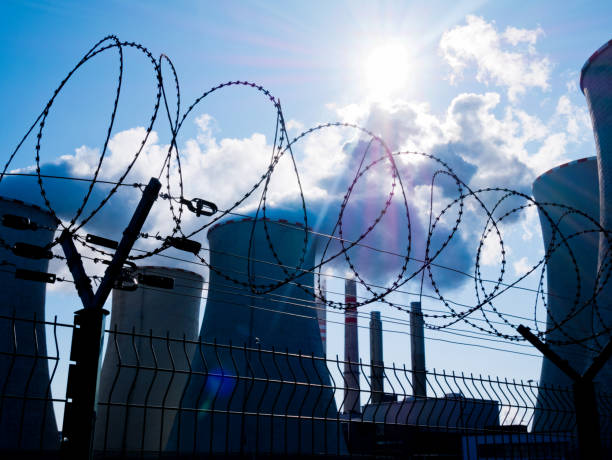istock Power Plant bihand Fence with Barbed Wire. 959591496