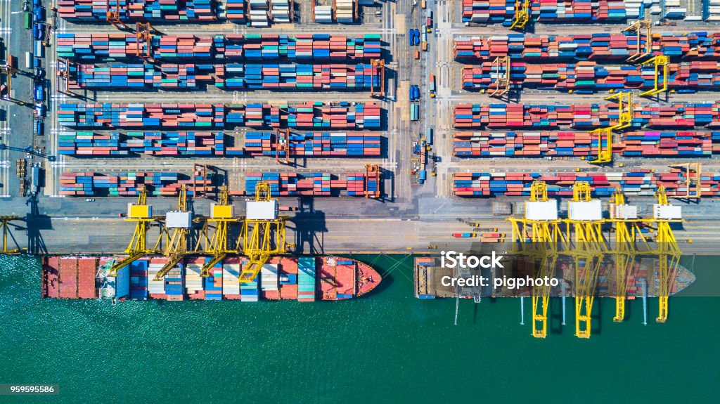 Aerial view of  Deep water port with cargo ship and container Freight Transportation Stock Photo