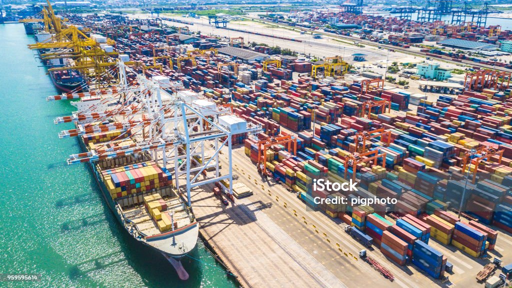 Aerial view of  Deep water port with cargo ship and container Commercial Dock Stock Photo