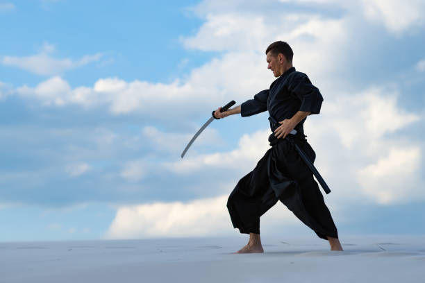 istock Man is practicing Japanese martial art - iaido 959598732
