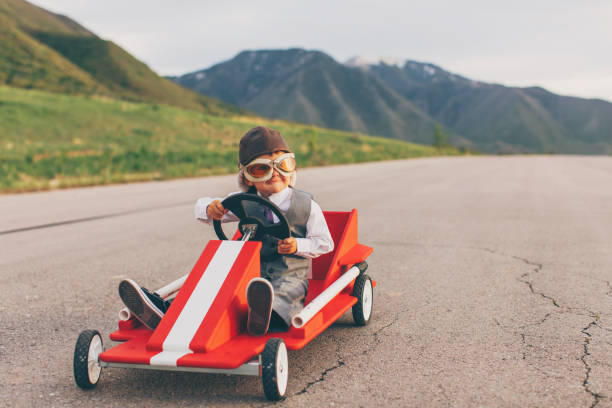 istock Young Business Boy Racing a Go Cart 959599256
