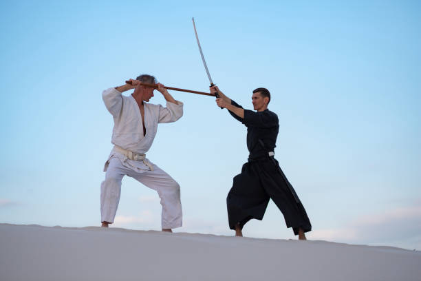 istock Two focused man, in Japanese clothes,are practicing martial arts 959599598