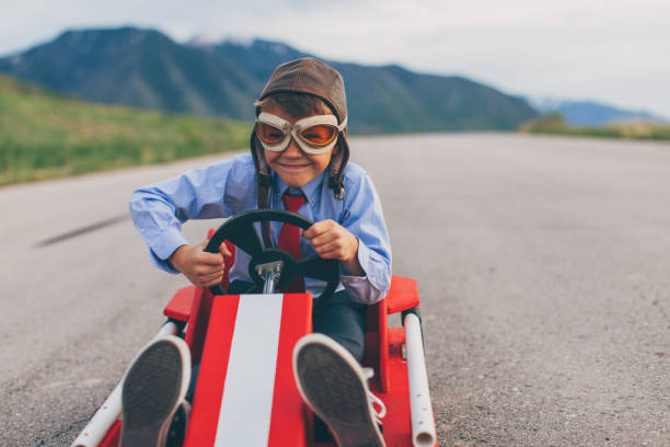 istock Young Business Boy Races Go Cart 959599902