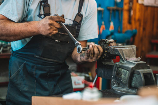 istock Manual worker repairing electric motor in a workshop 959600470