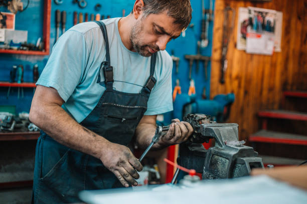 istock Manual worker repairing electric motor in a workshop 959600796