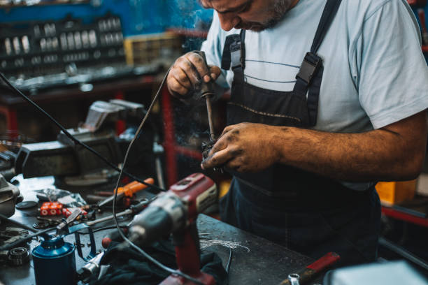istock Manual worker repairing electric motor in a workshop 959603844