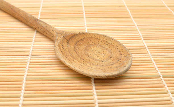 istock wooden ladle on bamboo 959604722