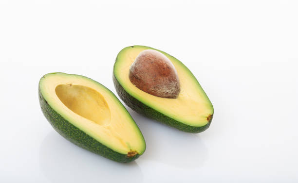 istock Avocado close up isolated on white background 959608750