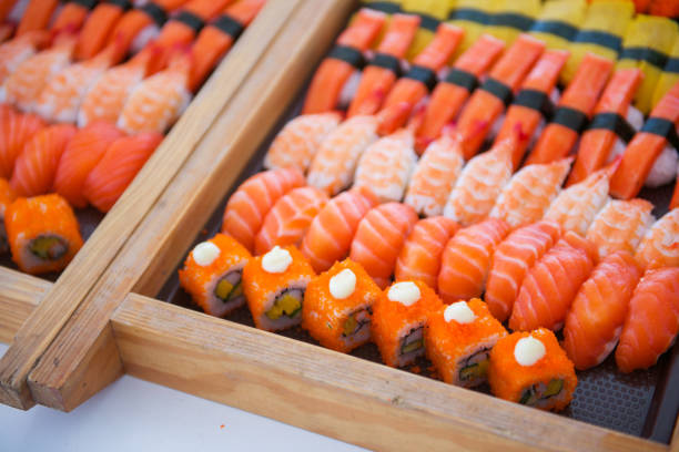 istock Sushi set on tray ready for eat 959609136