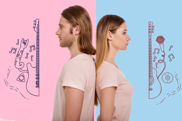 istock Calm people standing with their backs touching and thinking about music 959609140