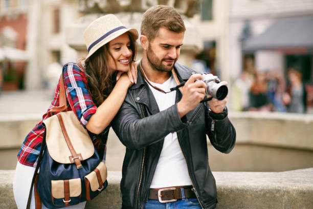istock Beautiful Couple Taking Photos On Camera, Traveling 959612476