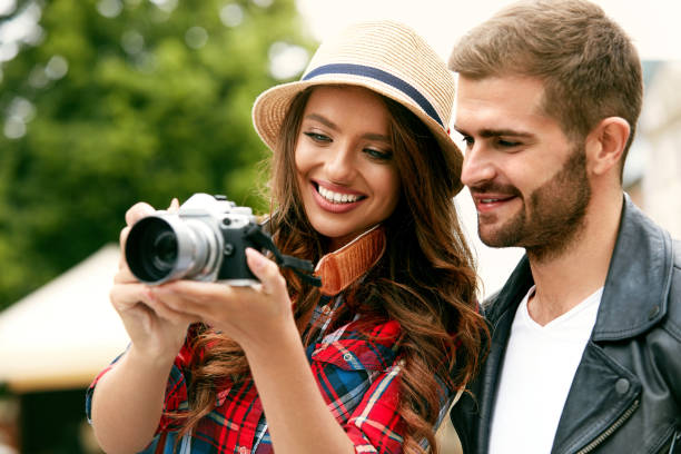 istock Beautiful Couple Taking Photos On Camera, Traveling 959612706