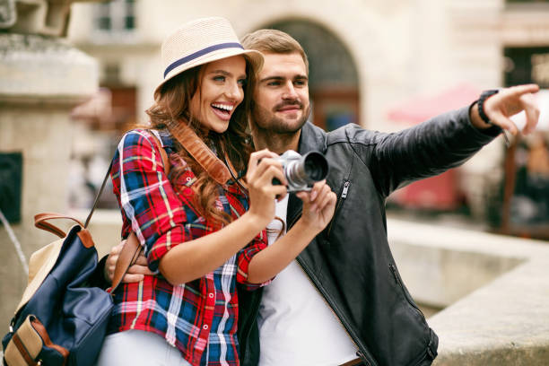 istock Beautiful Couple Taking Photos On Camera, Traveling 959612732