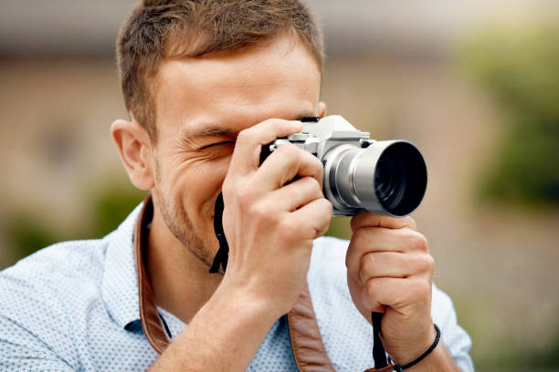 istock Tourist Man With Camera Taking Photos On Street. 959626632