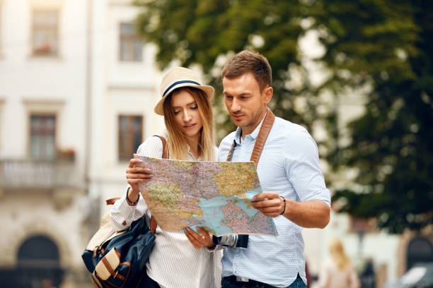 istock Couple With Map On Travel Vacations, Sightseeing 959629568
