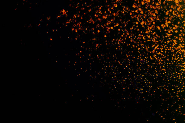 istock Glitter lights abstract background. Golden Sparkle stardust on blue and black defocused texture. 959634094