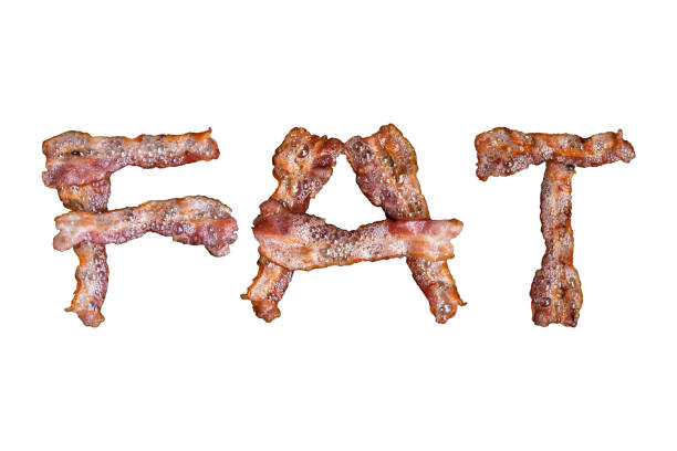 istock Bacon shaped as the word FAT on white background 959638158