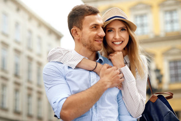 istock Happy Smiling Couple Together On Street 959638270