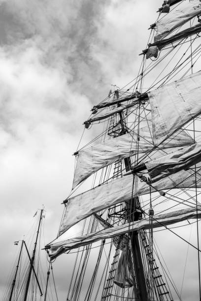istock Classic sailing ship mast with sails in black and white 959641748