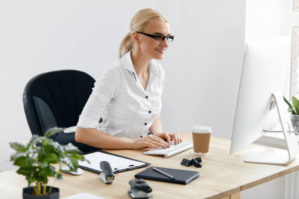 istock Business People. Woman Working On Computer In Office 959641792