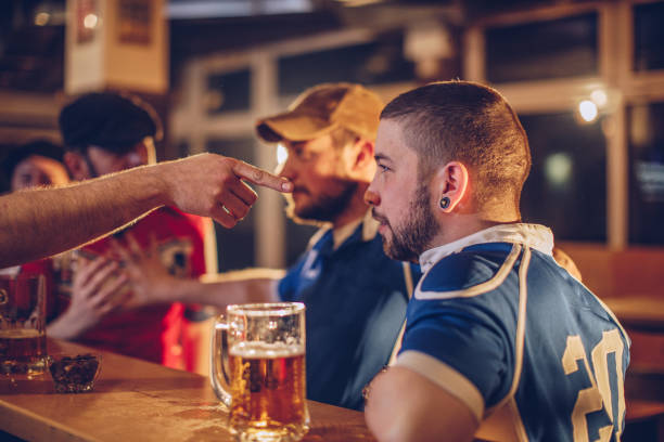 istock Group of men fighting in pub 959642262
