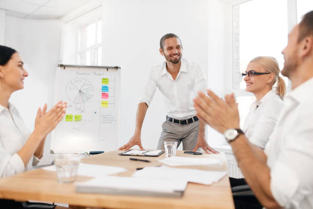 istock Team Meeting. Business Training With Employees In Office. 959642626