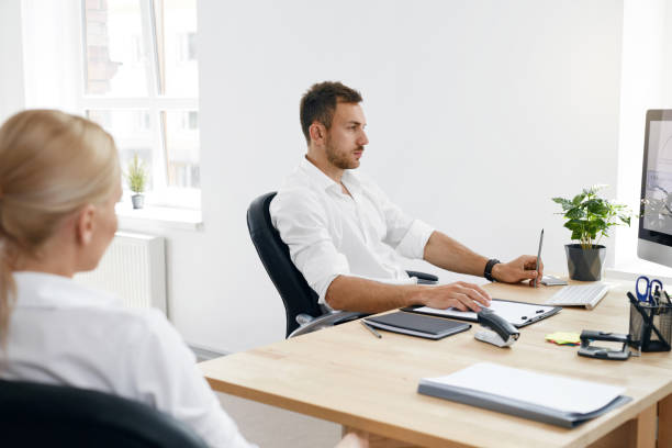 istock Team Of Business People Working In Office. 959643046