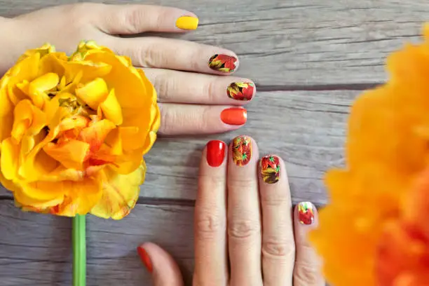 Photo of Manicure with tulips.