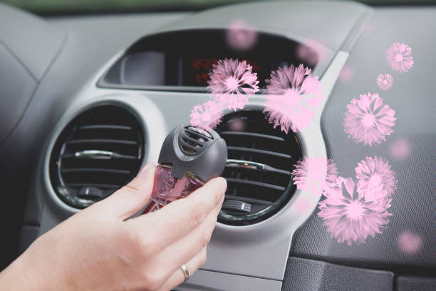 car air freshener mounted to ventilation panel - air freshener imagens e fotografias de stock