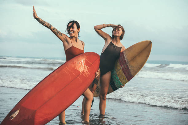 istock Females surfers 959655572
