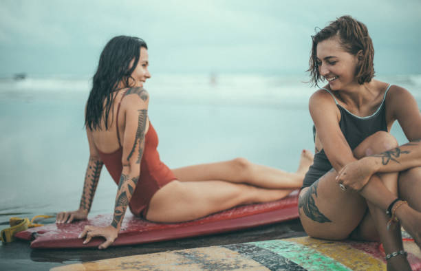 istock Beautiful women surfers 959657794