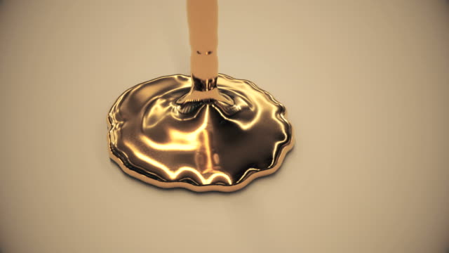 Animation of gold liquid pouring.