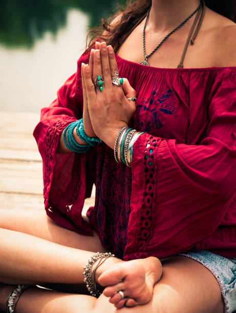 istock woman in a meditative yoga position 959662156