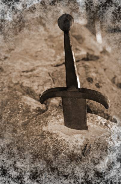 istock Magic Sword Excalibur in the stone of King Arthur with special e 959662844