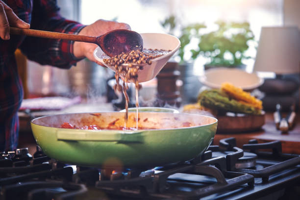 istock Preparing Tagliatelle Pasta with Vegan Bolognese and Bella Lodi Cheese 959666622