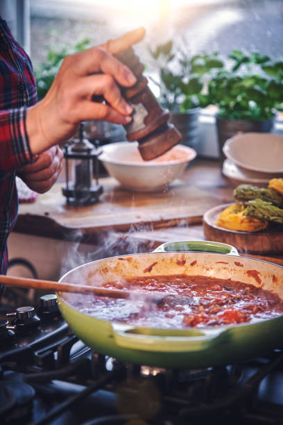 istock Preparing Tagliatelle Pasta with Vegan Bolognese and Bella Lodi Cheese 959666640