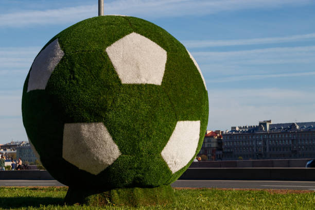 giant green soccer ball decoration of the city to the world cup in 2018 - fifa torneio imagens e fotografias de stock