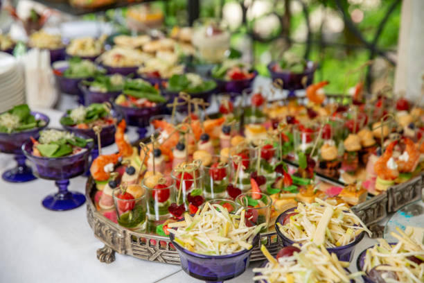 istock Light snacks, canap s with lard, cheese, meat, sauce, cherry tomatoes. Snacks for parties. 959670144