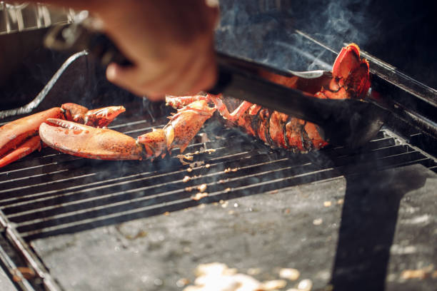 istock Lobster grilled barbecued seafood in BBQ Flames. 959670726