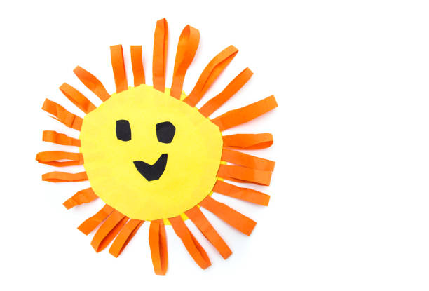 istock Children's handmade from colored paper - the sun with a smile isolated 959674296