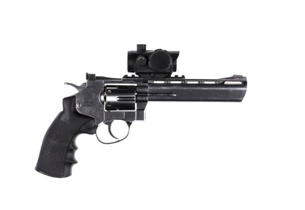 istock revolver with a collimator sight on a white isolated background 959675338