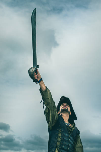Pirate holding a sword in a storm