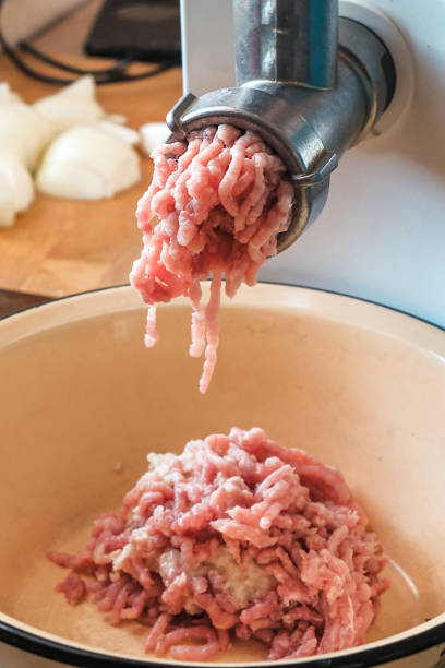 istock minced meat in a meat grinder 959685524