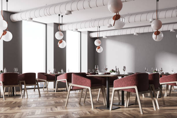 istock Corner of a loft cafe with red chairs 959689694