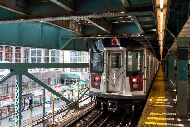 istock Subway Train Entering Station in New York City 959690186