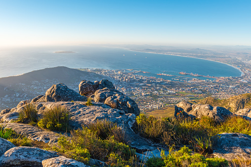 Cityscape of Cape Town at sunset seen from the Table Mountain national park, South Africa.